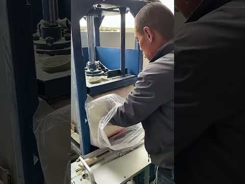 The process of packing cotton quilts- Good tools and machinery make work easy thumbnail