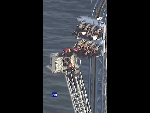 Texas roller coaster traps riders 30 meters in the air for hours | DW News thumbnail