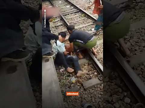 A heroic father shielded his child from an oncoming train. thumbnail