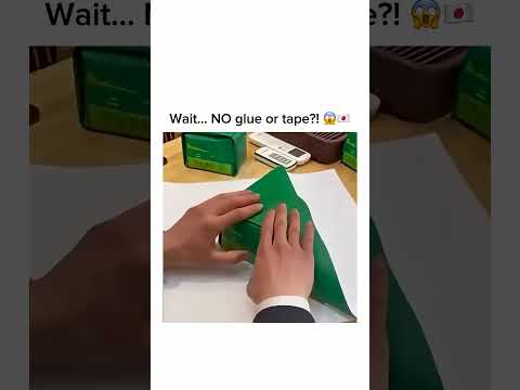 Gift wrapping with NO tape?! Subscribe for more! 🤯✨ #shorts thumbnail