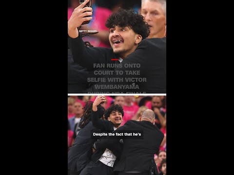 Fan runs onto court to take selfie with Victor Wembanyama during NBA Finals thumbnail