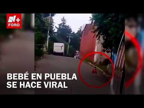 Captan a bebé gateando entre vehículos en Chignautla, Puebla thumbnail