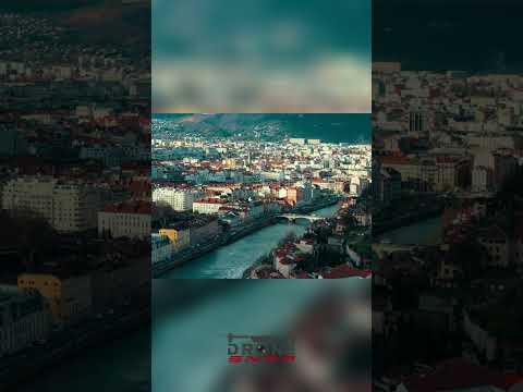 Stunning Cityscape: Witness the Beauty of Urban Life and Mountains! #shorts thumbnail