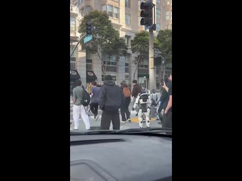 Bizarre scenes as humanoid robots clog San Francisco street thumbnail