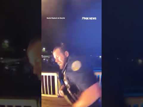 SEE IT: Hero cop kicks down door of burning building to rescue a family #shorts thumbnail