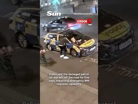 Moment thug kicks police wing mirror off in London thumbnail