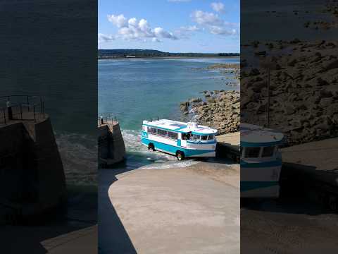 Amphibious Ferry Driving Into The Ocean thumbnail