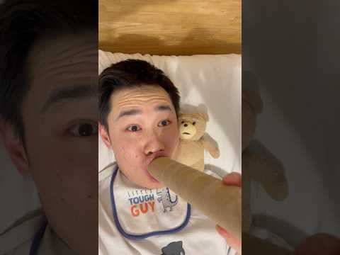 Baby uses a toilet paper tube thumbnail