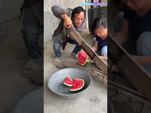 Creative rural scene: Cutting watermelons with hay cutters thumbnail