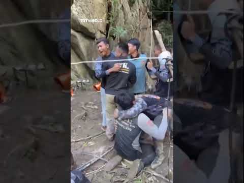 Rescuers celebrate after 5 trapped in Laos cave for a week rescued thumbnail