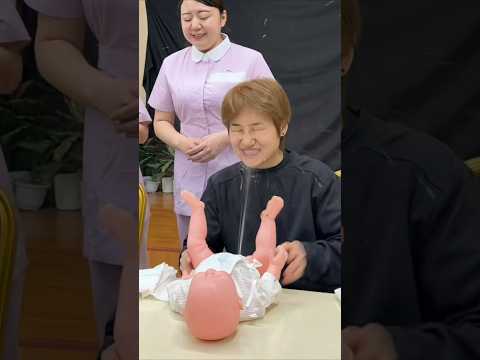 New fathers learn how to take care of babies. thumbnail