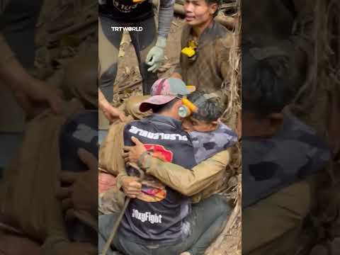 Laos cave survivor embraces brother in emotional scenes at rescue thumbnail