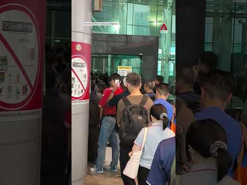 Tens of thousands stranded at Malaysia immigration checkpoints after 5-hour system crash thumbnail