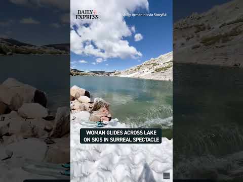 A skier seemed to defy gravity as she zoomed downhill before skimming across the surface of a lake ? thumbnail