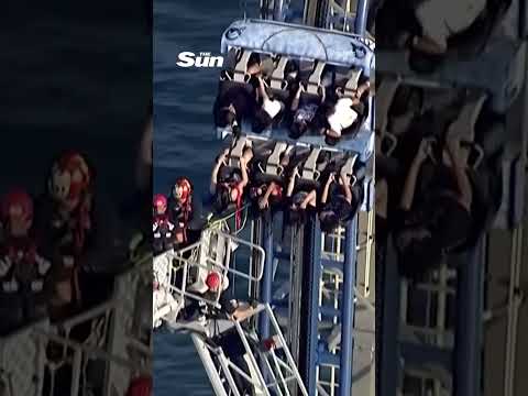Stomach-churning moment students left stranded on 100ft-high rollercoaster for hours thumbnail