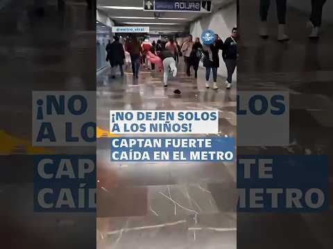 Captan aparatosa caída de un hombre y una menor en estación de la Línea 2 #shorts thumbnail