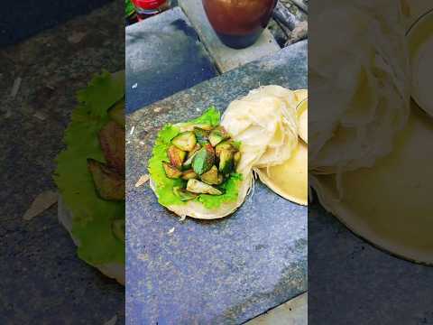 Grilled loofah on a stone slab—crispy and delicious! thumbnail
