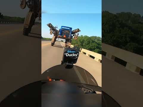 Biker Rides Underneath A Crazy Vehicle... thumbnail