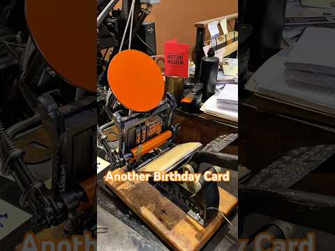 Letterpress printing another birthday card with orange ink using a tabletop printing press thumbnail