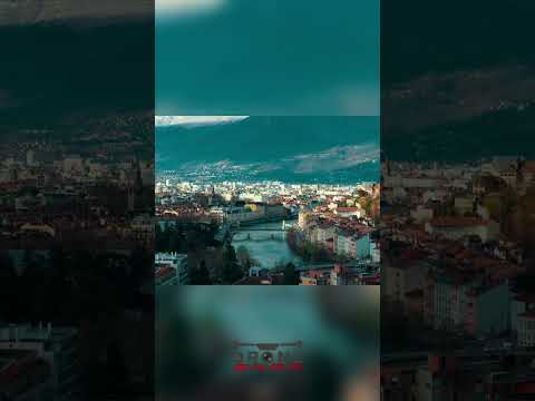 Cityscape Bliss: Witness Urban Life Meet Majestic Mountains! #shorts thumbnail