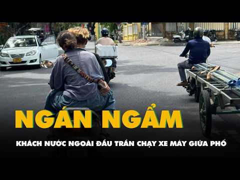 Ngán ngẩm khách Tây ngênh ngang đầu trần chạy xe máy giữa phố thumbnail