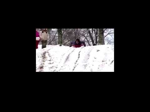 New Anchor Bites Off A Little Too Much In HILARIOUS Sledding BLOOPER! thumbnail
