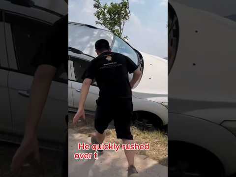 A dangerous tilted car...but kindness arrived just in time. #short,#kindness,#help,#love thumbnail