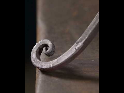 Organic shape forged with only a hammer #blacksmith #scroll #metalart thumbnail
