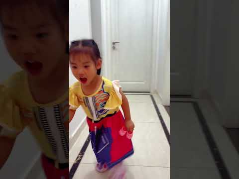 cute girl helps match shoes for dolls thumbnail