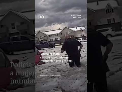 Policía rescata a mujer atrapada en inundación con granizo thumbnail