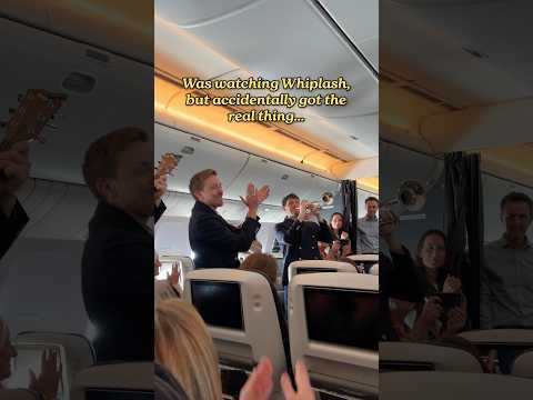Band surprises passengers on the Greater Together charter flight thumbnail