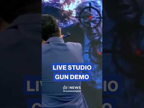 Iranian TV presenter fires rifle live on air thumbnail