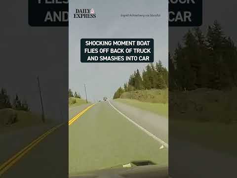 A road trip took a wrong turn after a boat flew off an oncoming truck and slammed into a car ? thumbnail