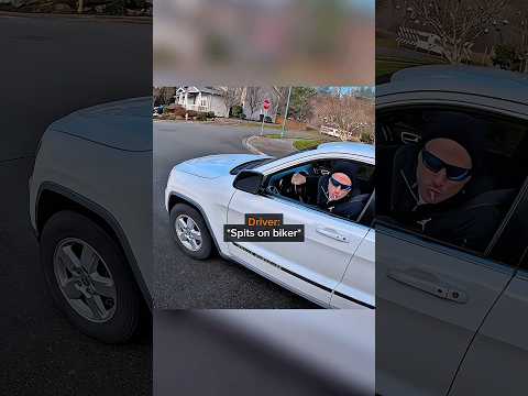 Driver Spits On Biker… Instantly Regrets It ? thumbnail