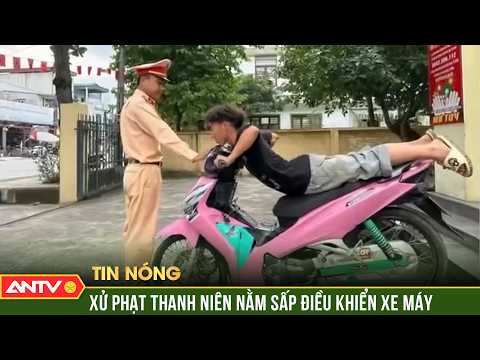 Xử phạt thanh niên nằm sấp điều khiển xe máy | ANTV thumbnail