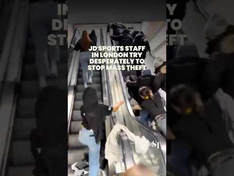 Staff at JD Sports try to stop group of youths robbing London store thumbnail