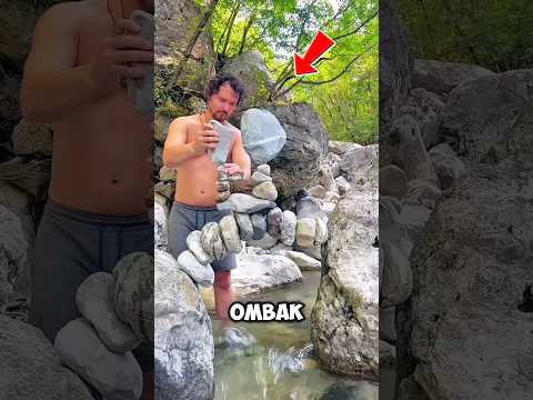nyusun batu sungai menantang hukum fisika. thumbnail