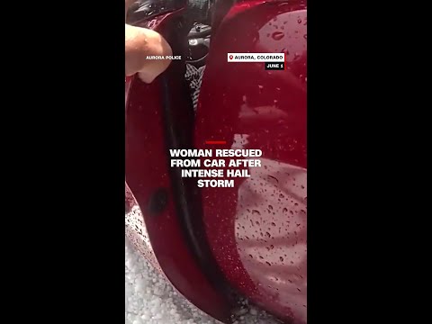 Woman rescued from car after intense hail storm thumbnail