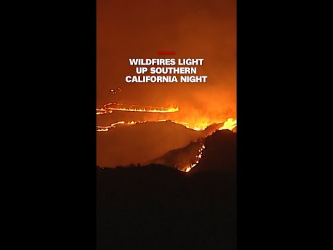 Wildfires light up Southern California night thumbnail