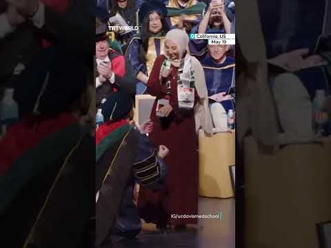 Medical school graduation takes surprising turn as student proposes to his partner thumbnail