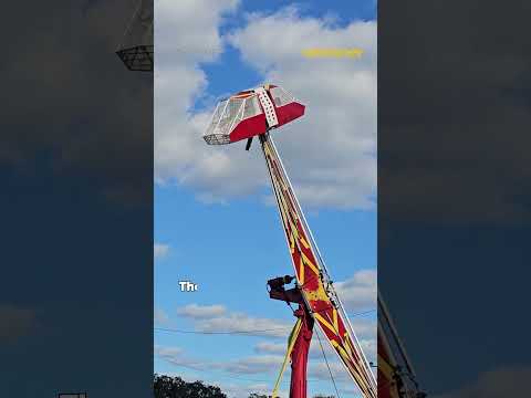 Hero Saves Child: Worker Dangles From Ride 30 Feet Up to Protect Young Girl #terrifying #survival thumbnail