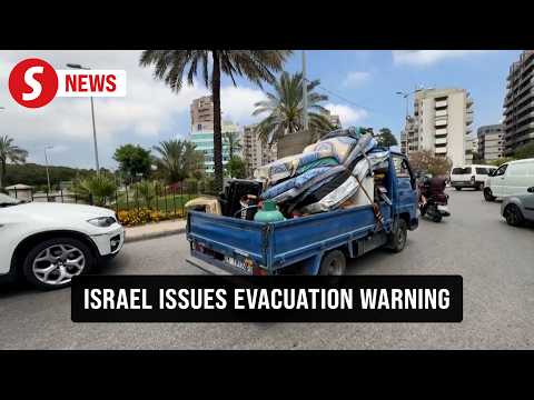 People flee Beirut's southern suburbs after Israel orders attacks on Hezbollah stronghold thumbnail
