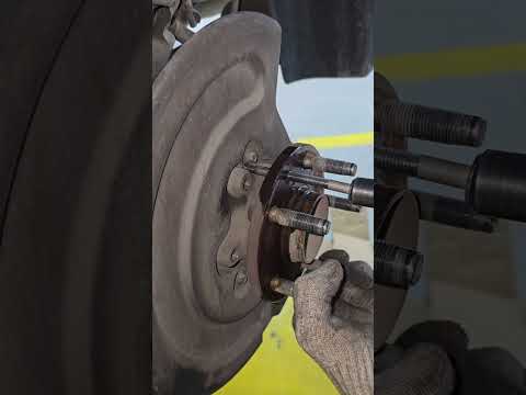 Ford Taurus rear wheel hub stuck removal trick #automotive #garage #trick thumbnail