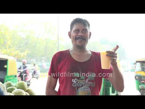 Street vendor prepares cooling Bael Sharbat for people during summer heat thumbnail