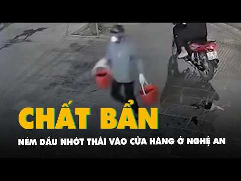 Camera ghi cảnh hai người ném dầu nhớt thải vào cửa hàng ở Nghệ An thumbnail