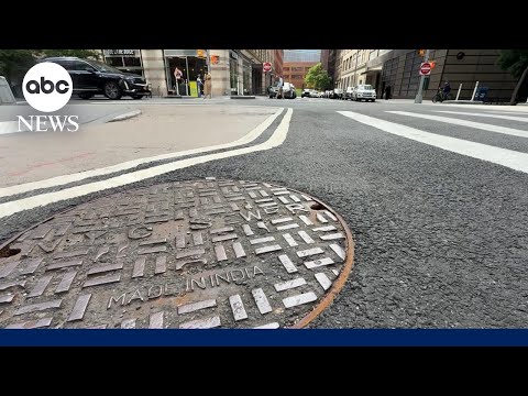Police investigate mystery men emerging from manholes thumbnail
