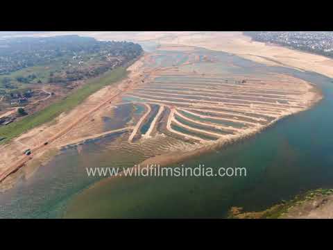 Birds eye view of Cuttack bridges and expansive Mahanadi Riverbed thumbnail