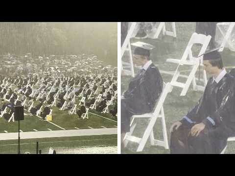 High School Students Graduate In The Pouring Rain thumbnail