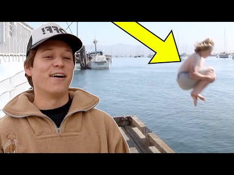 paying people to jump in shark infested water  thumbnail