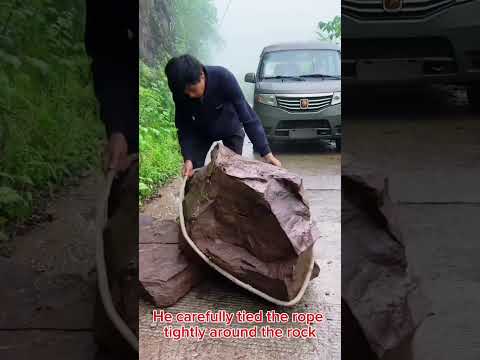 A rock in the middle of the road..and driver's kind heart in the rain #short,#kindness,#help,#love thumbnail